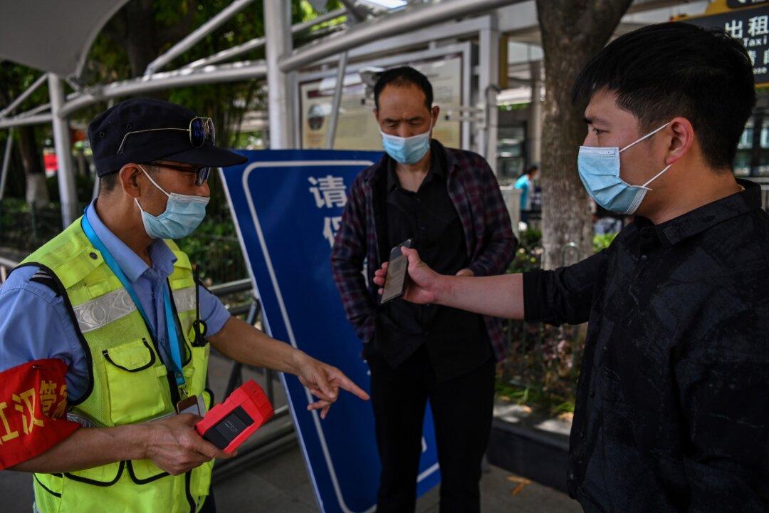Wuhan Orders Testing of All City Residents to Contain Virus’s Spread