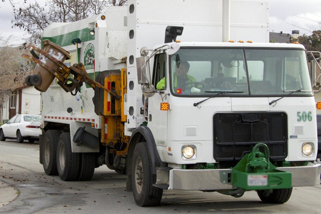 Garbage Truck Driver Sees 2 Grads During Home Lockdown Ceremony, Sings Ode in Their Honor
