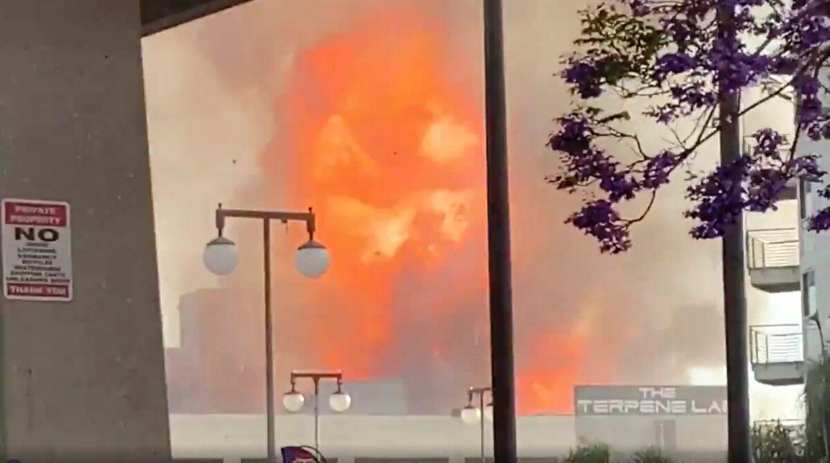 Flames from an explosion are seen in Los Angeles on May 16, 2020. (Sean Miura via AP)