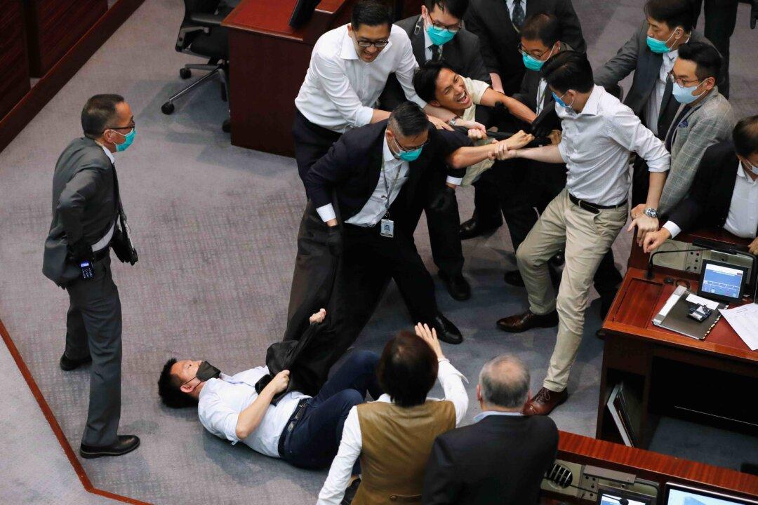 Hong Kong Lawmakers Clash as Pro-Beijing Camp Bypasses Process to Elect Chair After 6 Month Deadlock