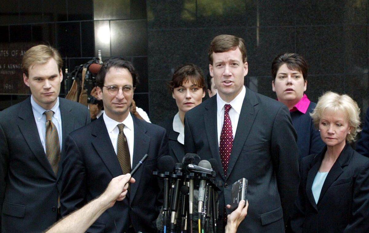 File photo showing federal prosecutors Matt Friedrich (L) and Andrew Weissmann (2ndL), FBI agent Paula Shanzel (3rdL), federal prosecutor Sam Buell (C), US Assistant District Attorney Leslie R. Caldwell (2ndR) and FBI agent Barbara Sullivan (R), outside the federal courts building in Houston, Texas, on 15 June 2002. (James Nielsen/AFP/Getty Images)