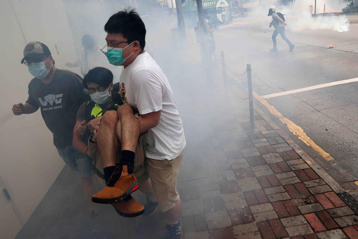 Tear Gas Fired as Hong Kong Protesters Return to Streets Against China’s National Security Law