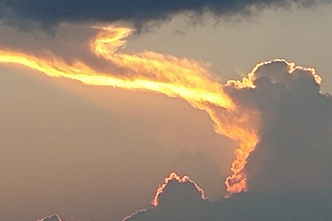 Unusual Cloud Looks Like a Huge ‘Dragon’ Breathing Fire Into the Sky