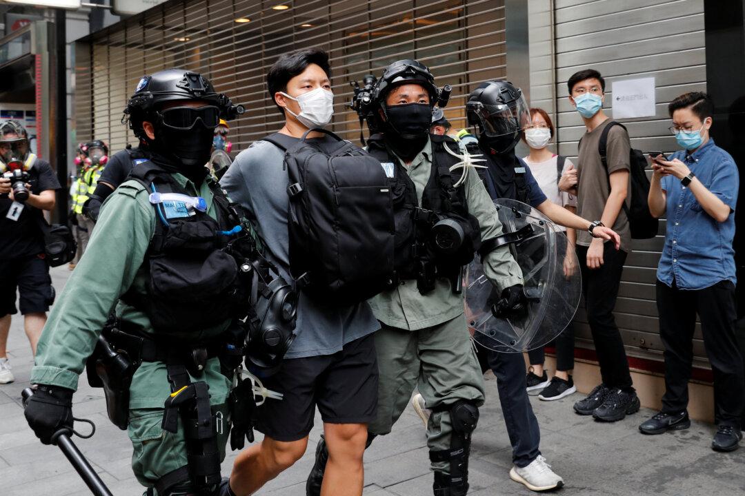 Hong Kong Police Arrest 300 as Thousands Protest