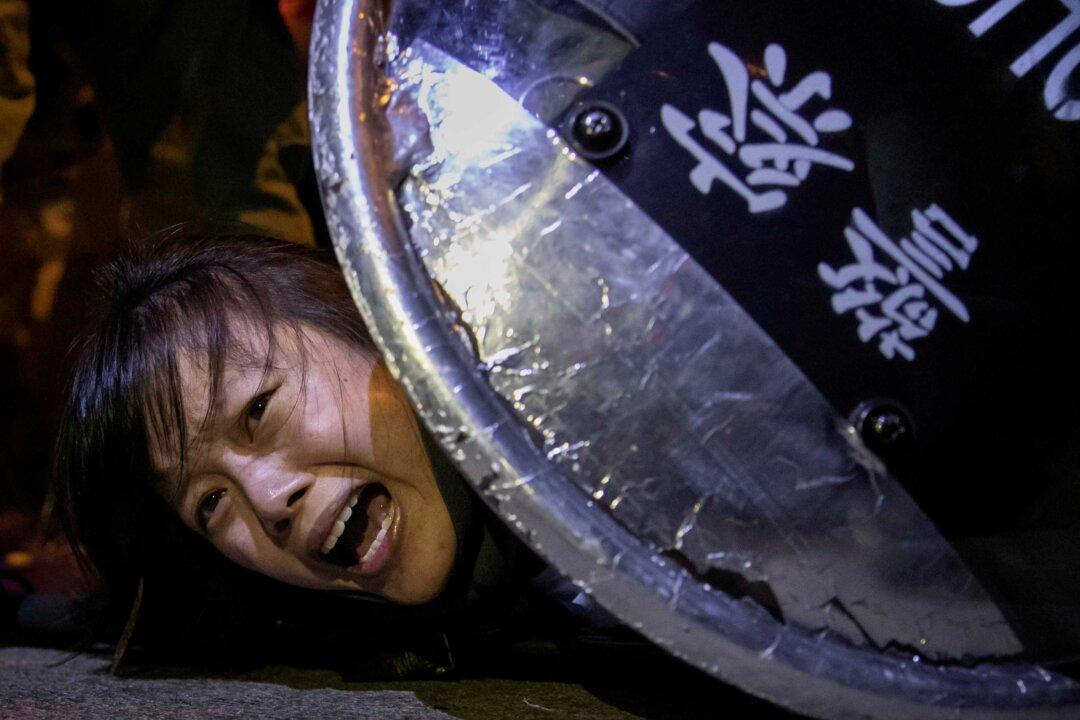 UK Rights Activists Seek to Prosecute British Expatriate Officers for Torture in Hong Kong