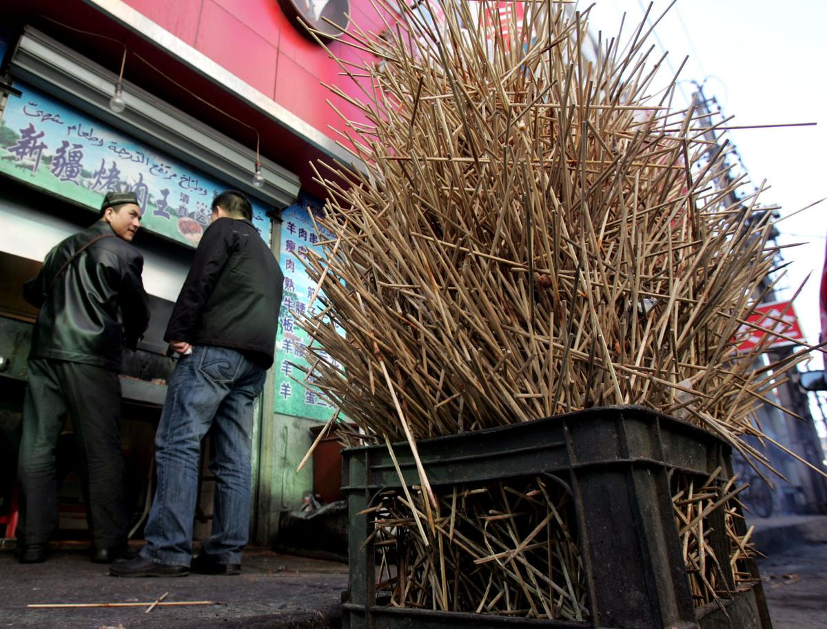 Used wooden chopsticks at a roasted mutton stall on a street on March 23, 2006, in Changchun of Jilin Province, China. (China Photos/Getty Images)