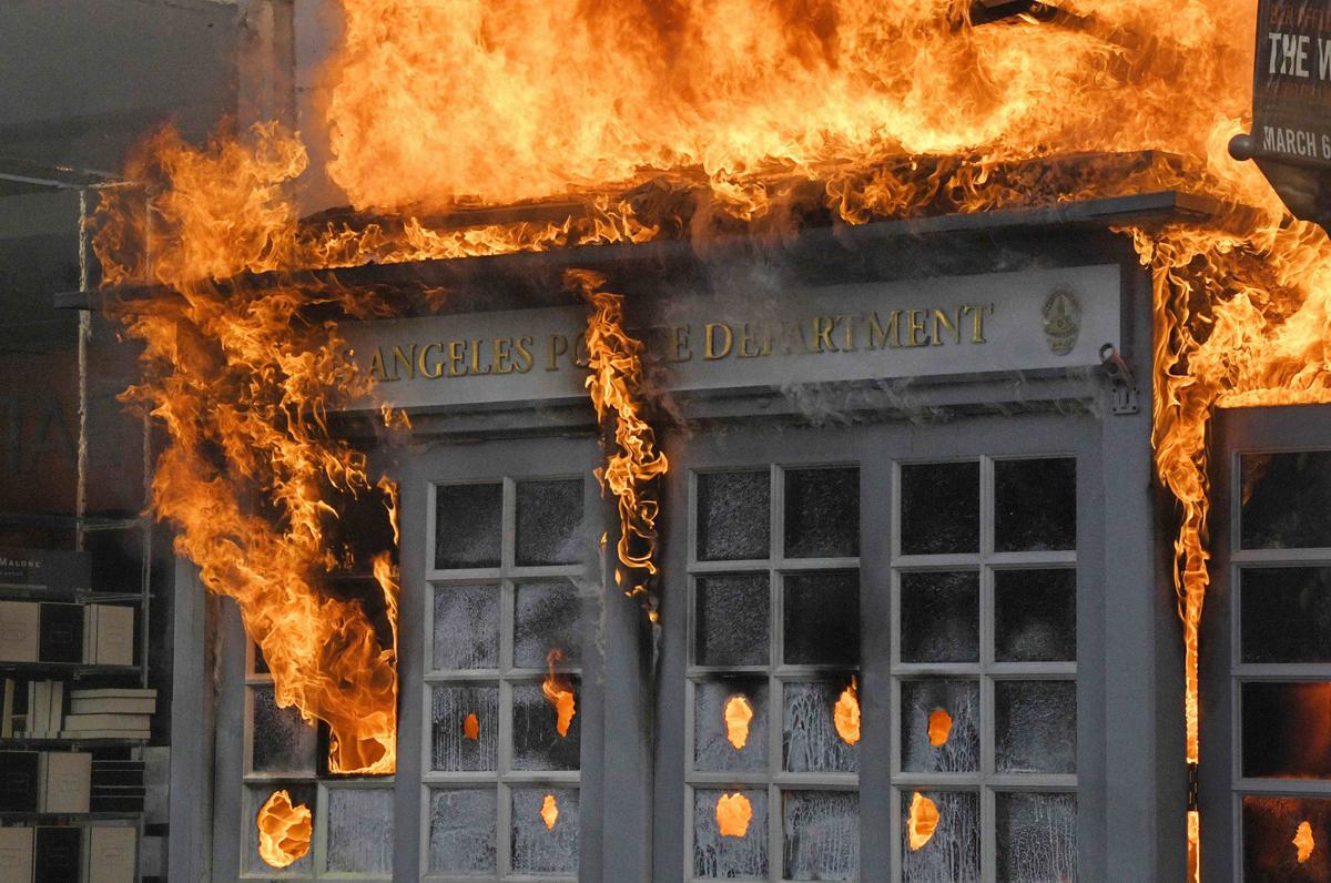 Dozens Injured, Stores Burned After Another Night of Violent Riots