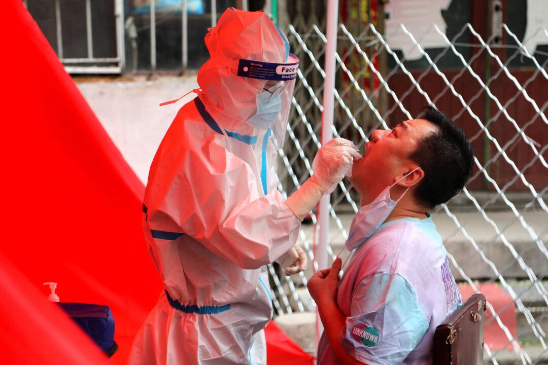 Chinese City Concealing Recent Virus Infections and Deaths, Residents Say