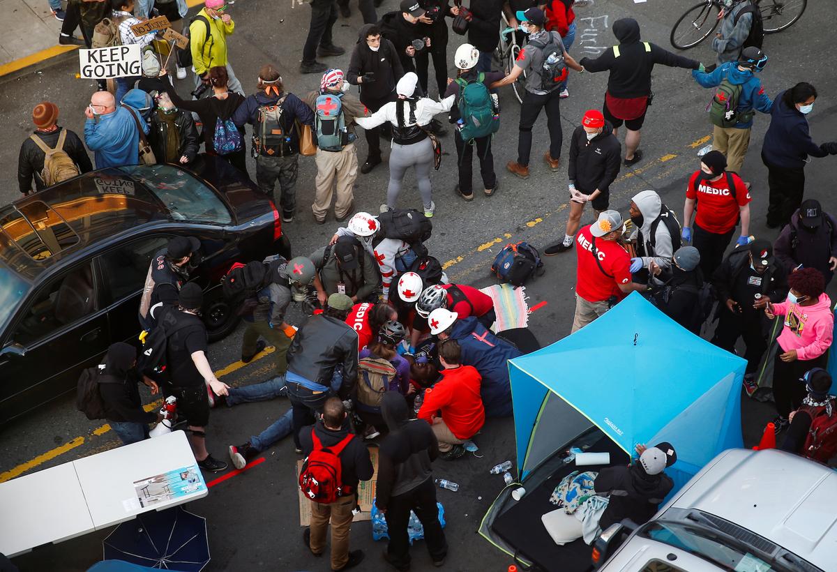 Seattle Driver Shoots Protester as Crowd Swarms His Car