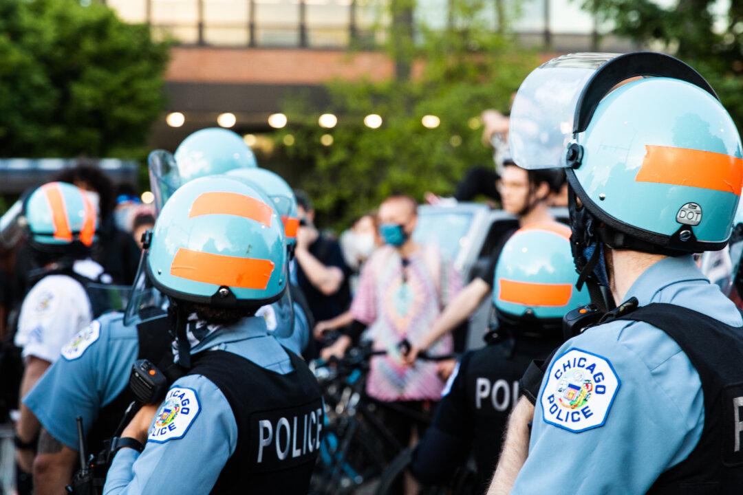 President of Chicago Police Board Says Police Struck Him With Batons During Protest