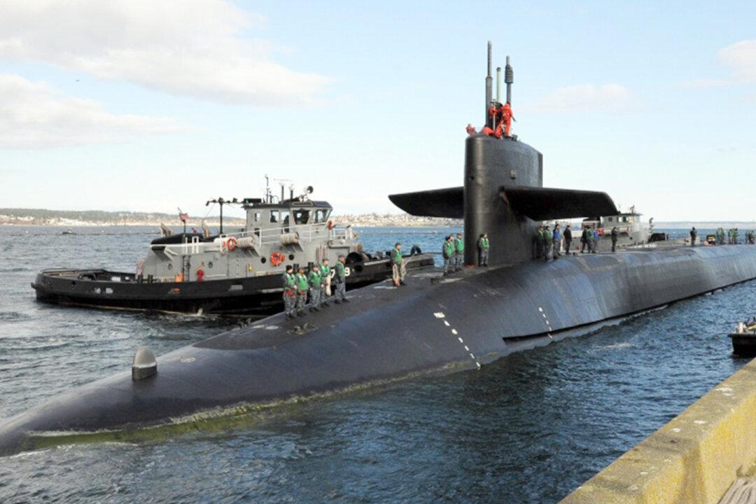 First Filipina US Naval Officer to Earn Submarine Warfare Insignia Boards Submarine USS Ohio