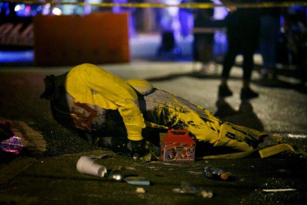 A police tape marks off a fallen statue from the Confederate monument in Portsmouth, Va., on June 10, 2020. (Kristen Zeis/The Virginian-Pilot/AP)