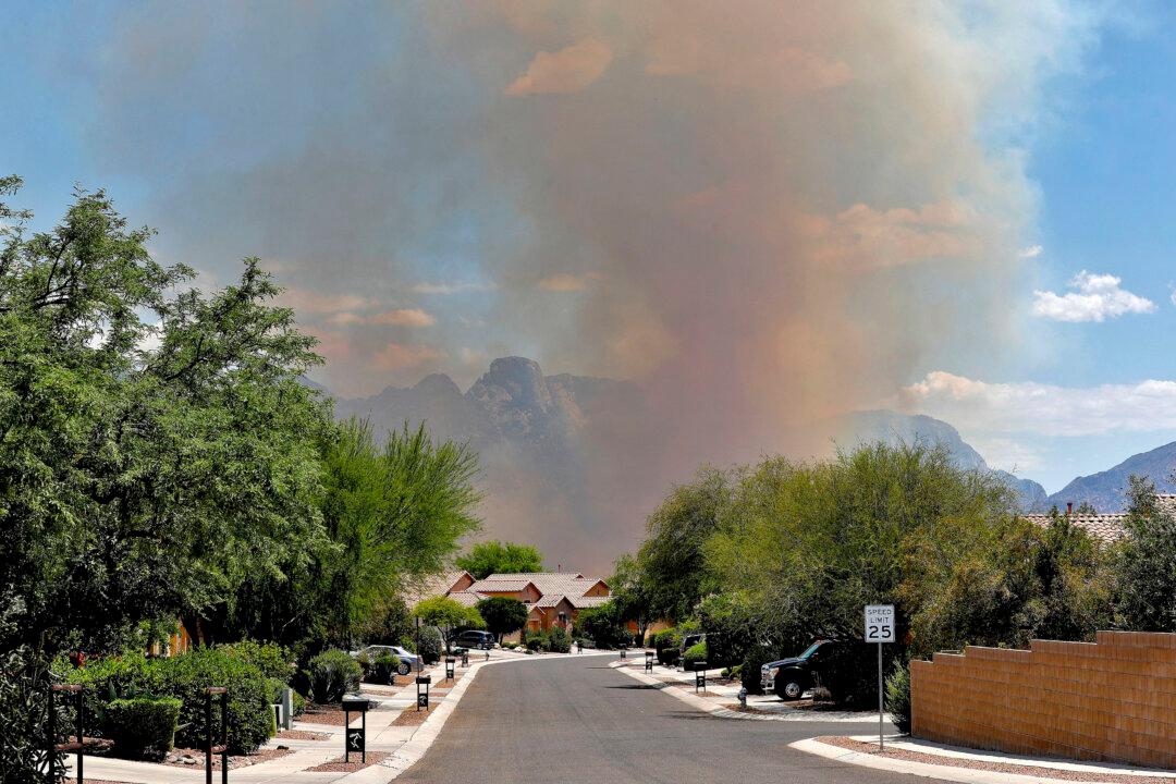 Firefighters Grapple With Triple-Digit Heat Against Wildfire