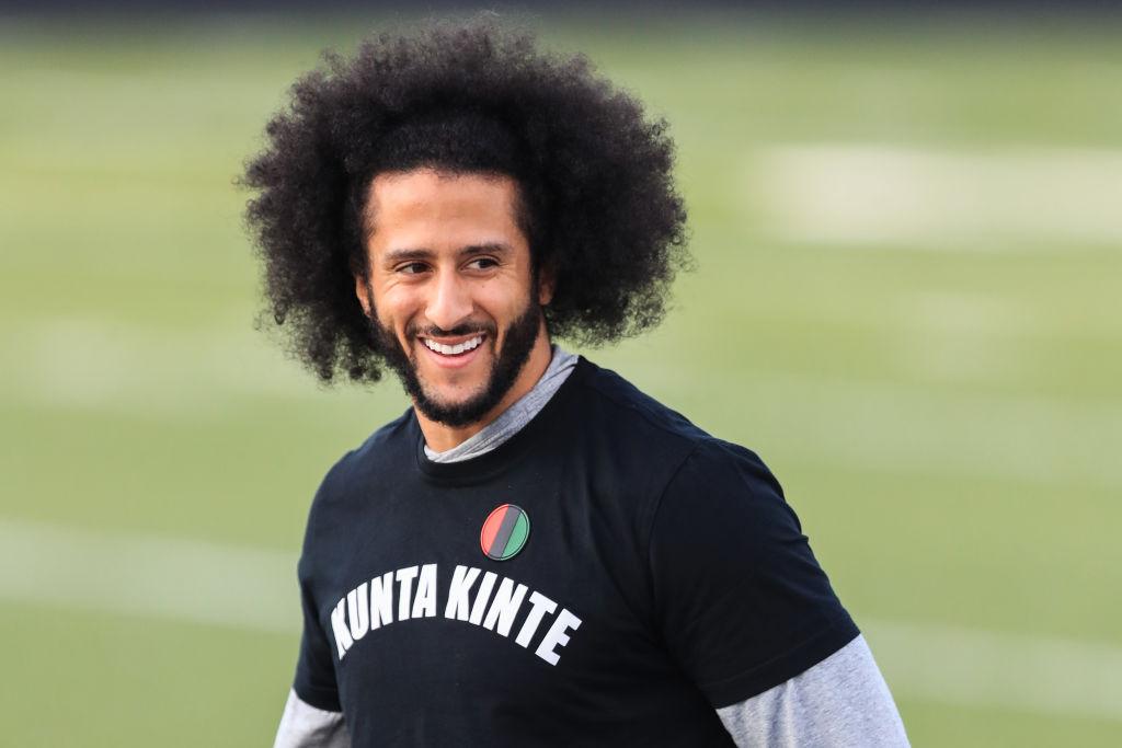 Kaepernick looks on during a private NFL workout held at Charles R. Drew High School in Riverdale, Georgia, on Nov. 16, 2019. (Carmen Mandato/Getty Images)