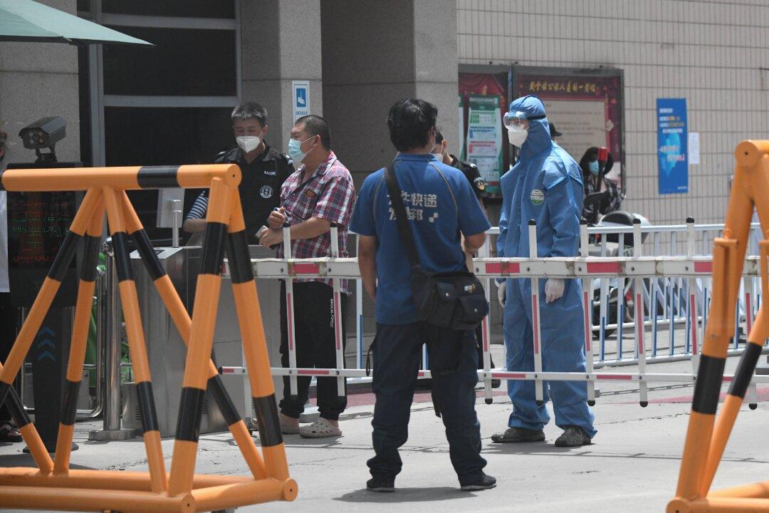 Beijing City Releases Inconsistent Data on New Virus Infections as Outbreak Worsens