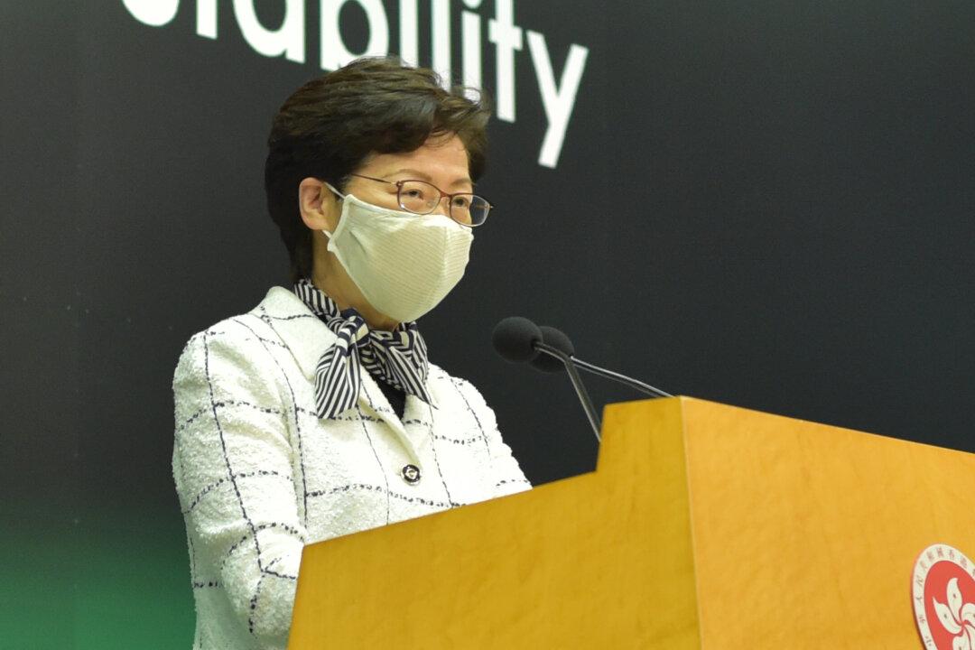 Hong Kong Leader Silent After Beijing Says It Reserves Jurisdiction Over National Security Law