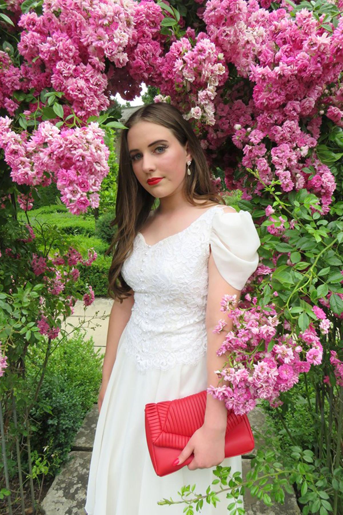 Grace Jeyes, from Melton Mowbray, wearing her mother's wedding dress to her prom. (Caters News)