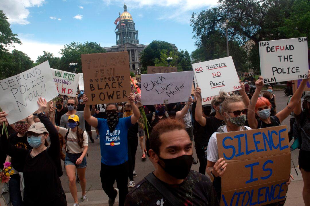 Colorado Bill Ending Qualified Immunity, Banning Chokeholds Signed Into Law