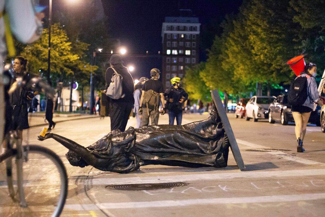 Wisconsin Governor Activates National Guard After Violence, Toppling of Statues