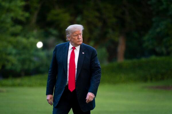 President Donald Trump walks to the White House residence after exiting Marine One on the South Lawn in Washington on June 25, 2020. (Drew Angerer/Getty Images)