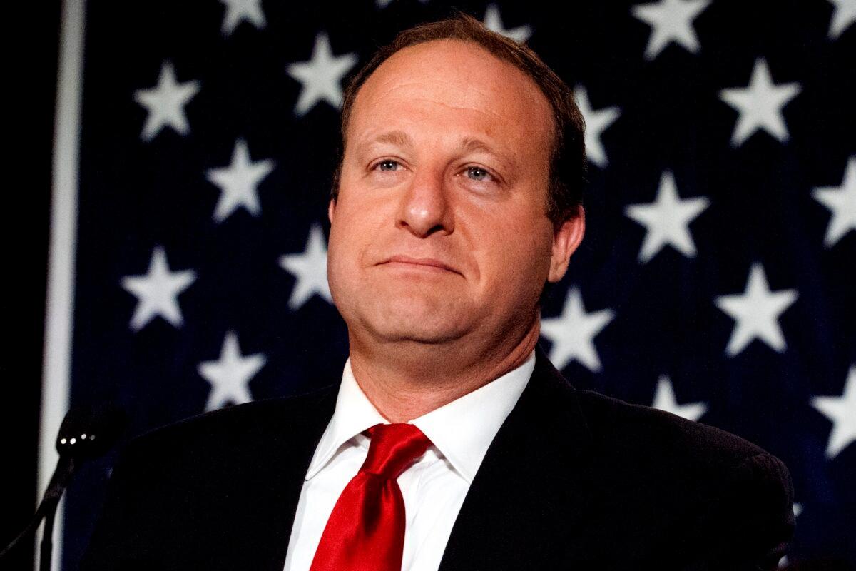 Colorado Governor Jared Polis, who when the photo was taken was Governor-elect, speaks at a rally in Denver, Colo., on Nov. 6, 2018. (Jason Connolly/AFP/Getty Images)