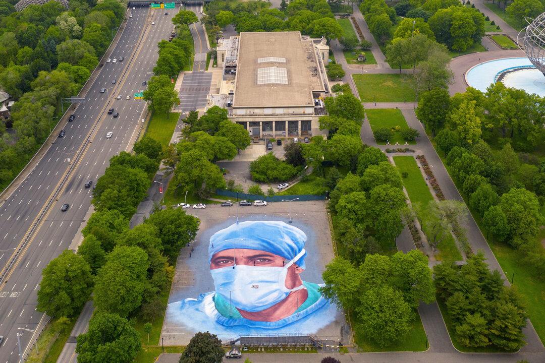 NYC Artist Turns Parking Lot Into HUGE Portrait Painting of Immigrant Doctor Who Died of COVID