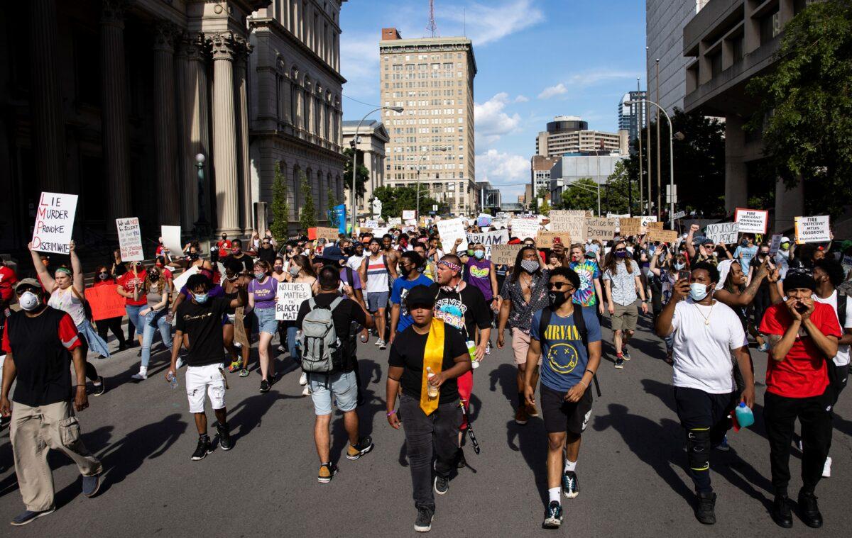 Black Lives Matter protesters march through downtown in Louisville, Ky., on June 5, 2020. (Brett Carlsen/Getty Images)