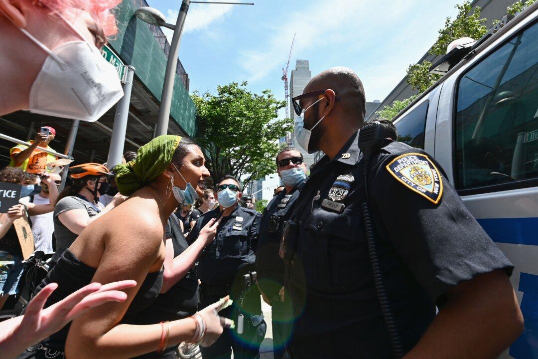 New York Lawmakers Cut $1 Billion From NYPD Budget