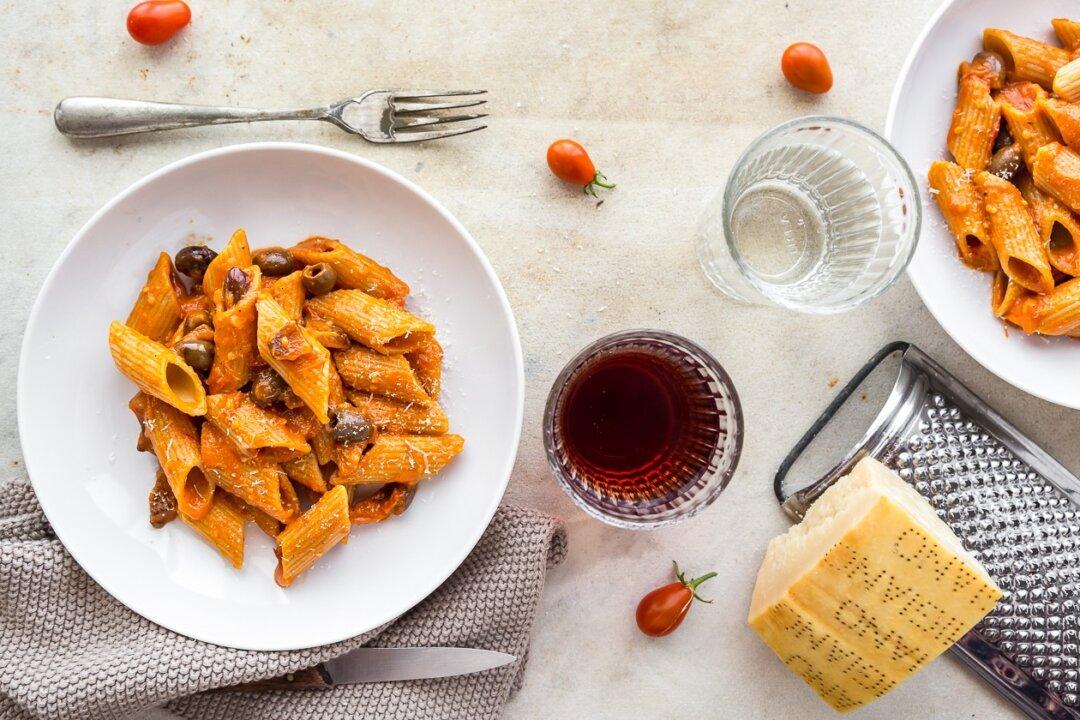 Pasta With Garlic Tomato Sauce, Olives, and Guanciale