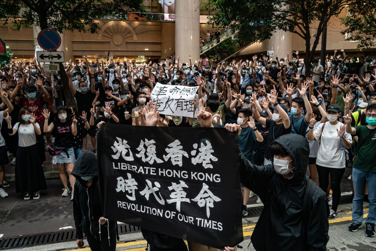 Hong Kong Authorities Ban Popular Protest Slogan in Latest Clampdown on Free Speech