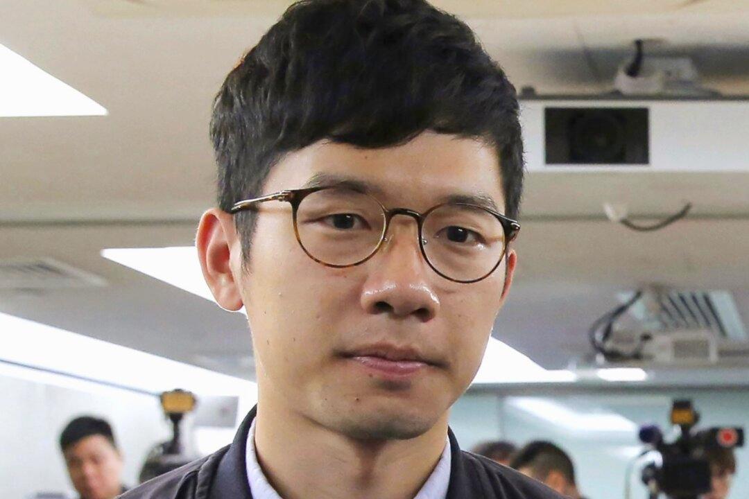 Hong Kong Democracy Activist Flees to Undisclosed Location Days After Strict National Security Law Takes Effect