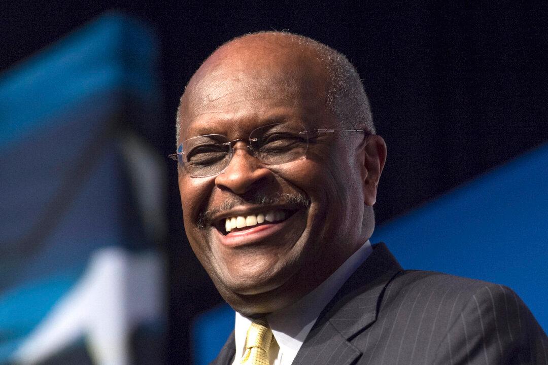 Herman Cain Hospitalized After Testing Positive for COVID-19
