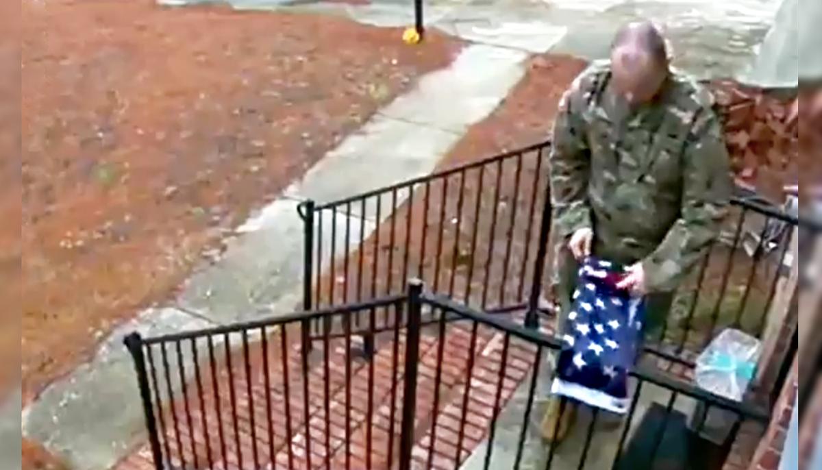 Touching Video Captures a Soldier Folding a Fallen American Flag Outside Stranger’s House