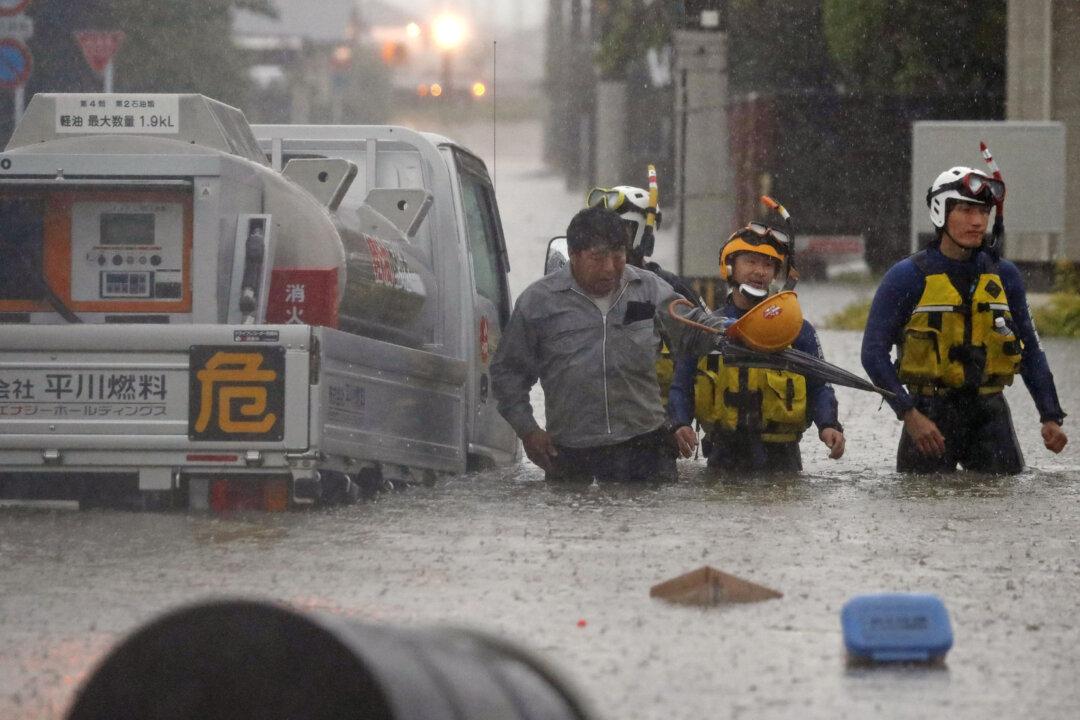 More Than 50 Dead as Japan Boosts Rescue Efforts and Warns of More Rain in Flood-Hit Areas