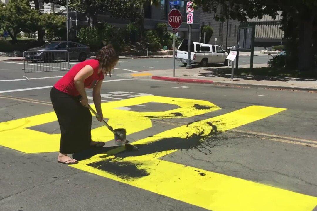 2 People Charged With Hate Crime After Allegedly Vandalizing Black Lives Matter Mural