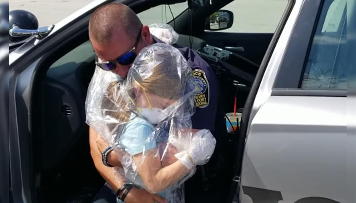 Georgia Officer’s Daughter Wraps Up in Protective Gear and Gives Her Dad an Emotional Hug