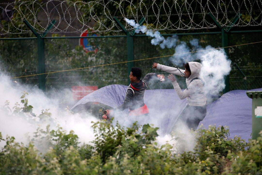 New British-French Deal to Fight ‘Vile People Smuggling’