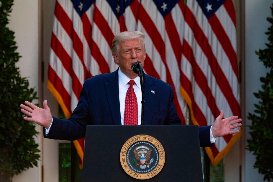 Trump Defends St. Louis Couple Who Brandished Guns, Hints He’ll Take Action