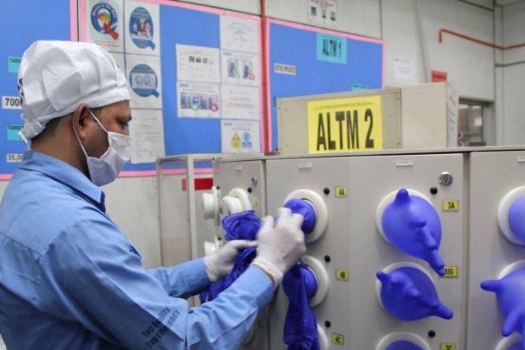 Amid Virus Crisis, US Bars Imports of Malaysia’s Top Glove Over Labor Issues