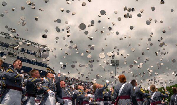 West Point graduates toss their hats in the air at the conclusion of the U.S. Military Academy Class of 2019 graduation ceremony at Michie Stadium, in West Point, N.Y., on May 25, 2019. (David Dee Delgado/Getty Images)