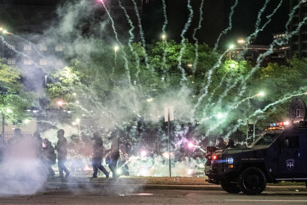 Detroit Officer Charged After Shooting Photojournalists With Rubber Pellets