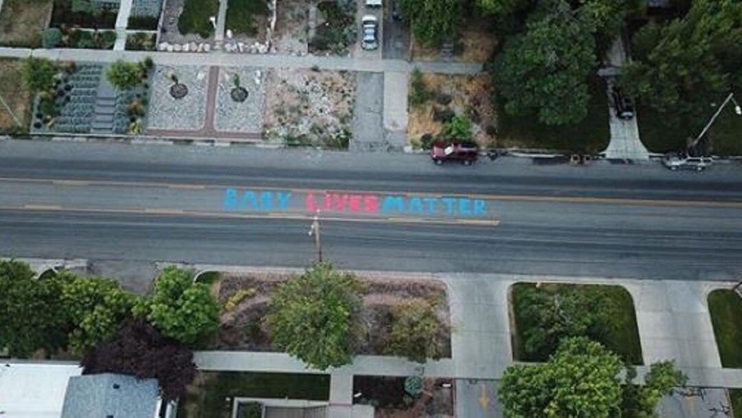 Artist Paints ‘Baby Lives Matter’ Mural Outside Planned Parenthood Office