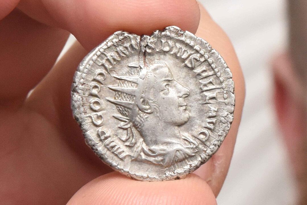 UK Man Stumbles on 1800-Year-Old Roman Silver Coin While Picking Litter in a Park