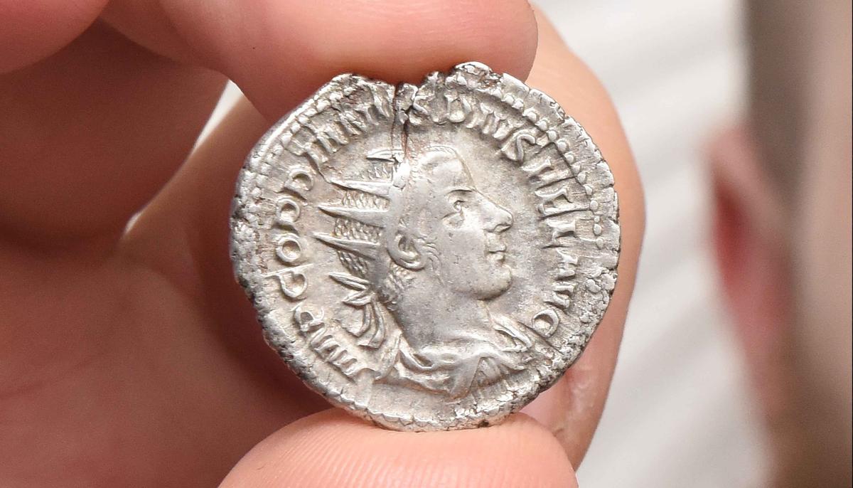 UK Man Stumbles on 1800-Year-Old Roman Silver Coin While Picking Litter in a Park