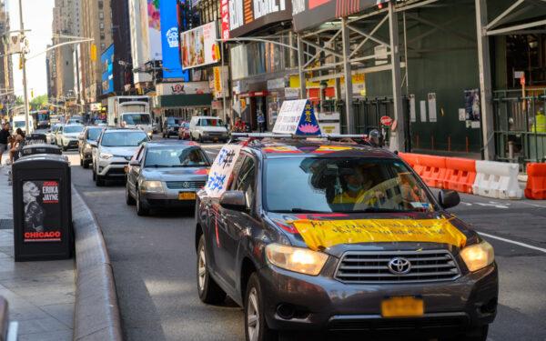 Falun Gong practitioners tour around New York in a car parade to commemorate the 21st year of the persecution in China, on July 18, 2020. (Pan Jun/The Epoch Times)