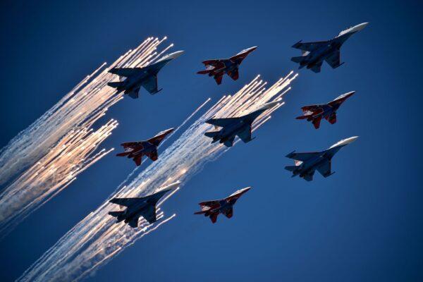 Russian Su-27 jet fighters and MIG 29 jet fighters fly over Red Square in Moscow on May 9, 2016. (Kirill Kudryavtsev/AFP via Getty Images)