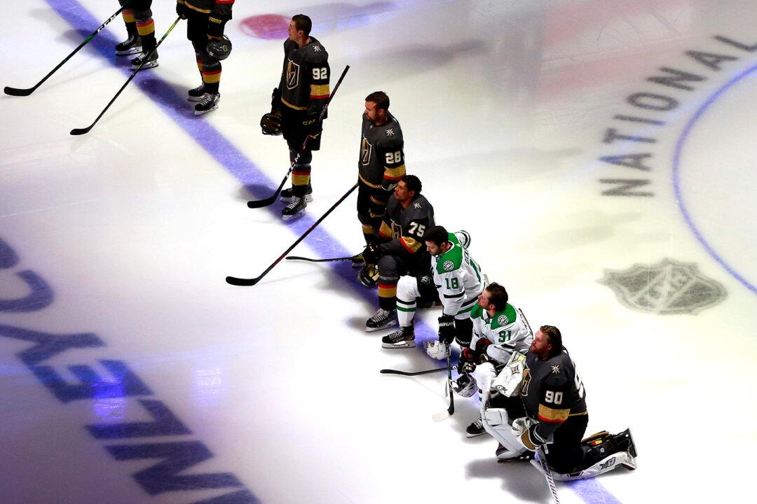 Every NHL Player Stood for National Anthem During Season Restart, but 4 Kneel This Week