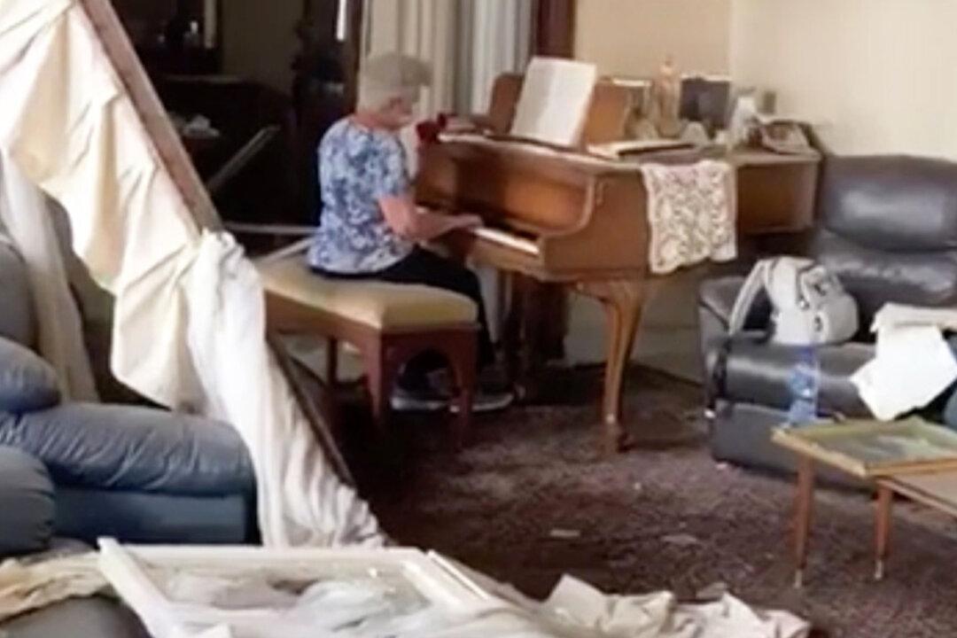 Grandma Plays ‘Auld Lang Syne’ on a Piano Surrounded by Rubble From the Beirut Explosion