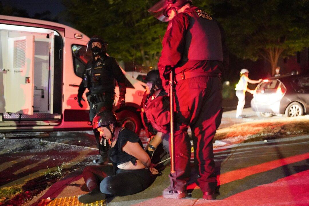 Portland Rioters Hurl Chunks of Concrete at Police During Clashes