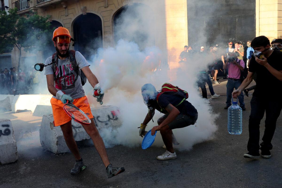 Demonstrators take part in a protest following the blast in Beirut, Lebanon, on Aug.10, 2020. (Alkis Konstantinidis/Reuters)